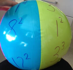 beach ball with exponent problems on it